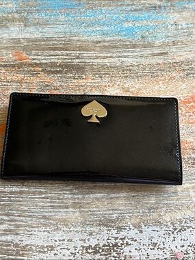 kate spade Black Patent Leather Slim Wallet with Gold Spade Logo